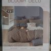 Parure de lit beige et blanc