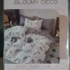 Parure de lit beige et blanc